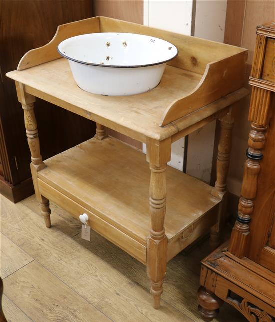 A Victorian pine wash stand with ceramic bowl W.77cm